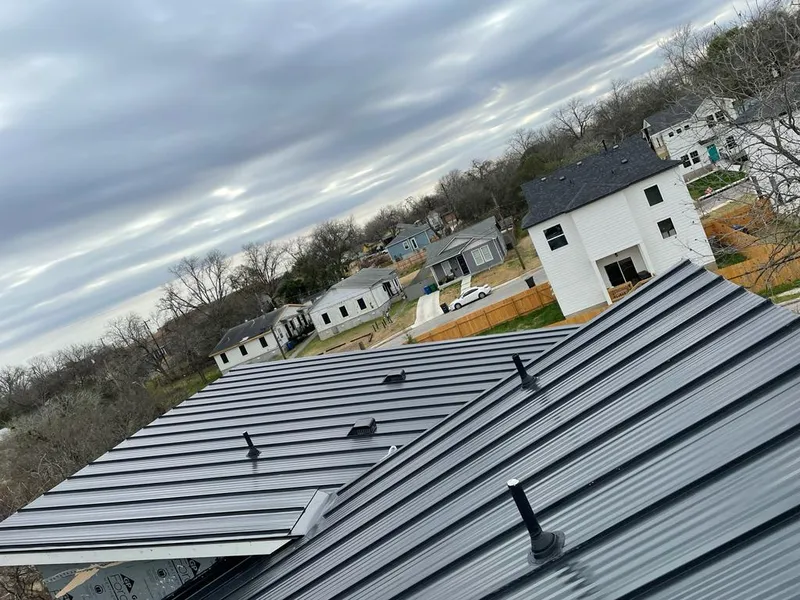 Standing seam metal roof panels with vents for Skylight Repair in Estelle